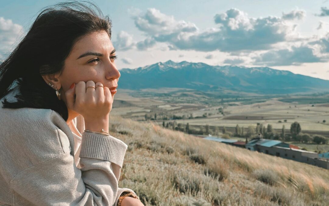 woman looking outside thinking about abortion
